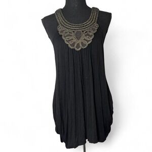 Black beaded dress with gold accents